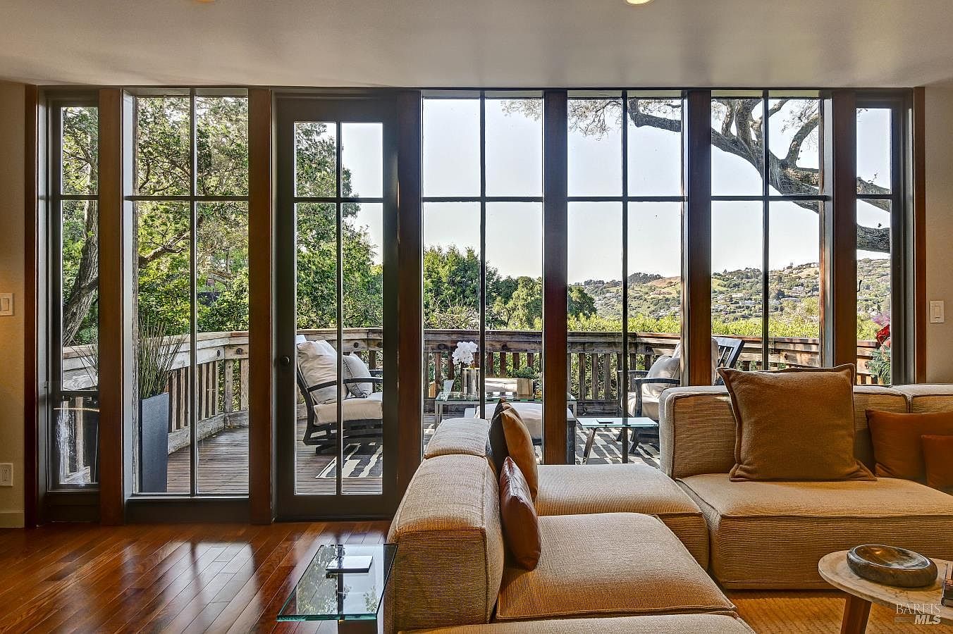 Exterior front of the house with the Bella Vista hillside framing the entry path